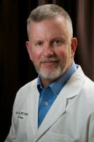 John Lundeby, MD, FACS, FAACS