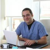 Alper Tuncel, MD